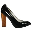Zapatos de salón de cuero negro con tacones de madera de Yves Saint Laurent