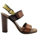 Prada Block-Heel Slingback Sandals in Brown Patent Leather