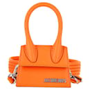 Bolsa com alça superior exclusiva Jacquemus Le Chiquito Mini em couro laranja