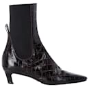 Totême Croc-Effect Ankle Boots in Brown Leather