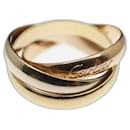 Les Must De Cartier Trinity Band Ring 18 karat Rose, White and yellow gold Gold hardware EU 52