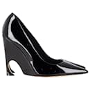 Zapatos de tacón con cuña y punta estrecha Dior en charol negro
