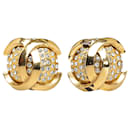 Boucles d'oreilles clips en strass CC dorées Chanel