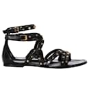 Saint Laurent Studded Strappy Flat Sandals in Black Leather