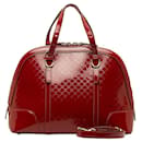 Bella borsa con manico superiore in pelle verniciata Microguccissima 309617 - Gucci