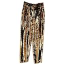 Dolce & Gabbana Shimmering Trousers in Gold Sequined Polyester