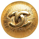 Broche Chanel CC dorée