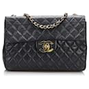 Black Chanel Jumbo Classic Lambskin lined Flap Shoulder Bag