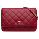Portafoglio classico Chanel rosso in pelle di agnello su borsa a tracolla con catena