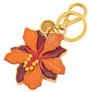 Orangefarbener Prada Saffiano-Schlüsselring mit Blütenblatt 