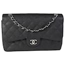 Chanel Black Quilted Caviar Jumbo Classic lined Flap Bag