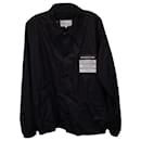 Maison Martin Margiela Stereotype Patch Coach Jacket in Black Polyamide
