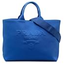Bolso satchel mediano de lona con logo de Prada en azul