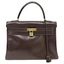 VINTAGE HERMES KELLY HANDTASCHE 32 Zurückgegebene braune Handtasche aus Leder in Box - Hermès