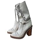 Chanel 2013 White Patent Leather Chain Obsession Heeled Calf Boots