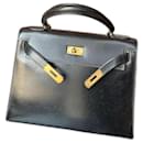 Kelly 28 black gold box leather - Hermès