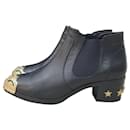 CHANEL Dallas Black Leather Ankle Boots - Chanel