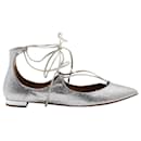 Aquazzura Glittered Christy Lace-up Pointed-Toe Flats in Silver Leather