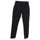 Saint Laurent Coated Slim-Fit Jeans aus schwarzer Baumwolle
