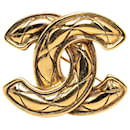 Goldene Chanel CC Steppbrosche