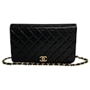 Bolsa acolchoada com aba completa CC - Chanel