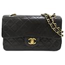 Black Chanel Small Classic Lambskin lined Flap Shoulder Bag