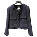 Chanel tweed uniform jacket 38