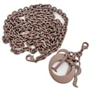 Removable chain shoulder strap in powder pink Christian Dior with D.I.O.R. pendant.