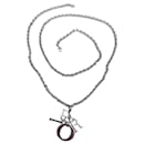 Removable silver chain shoulder strap by Christian Dior with D.I.O.R. pendant.