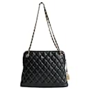 Chanel 31 Rue Cambon vintage shoulder bag in black matelassé leather