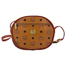 Bolso bandolera vintage MCM, bolso pequeño, color coñac marrón con estampado de logo.
