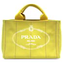 Gelbe Tragetasche „Canapa“ mit Logo von Prada