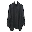 Balenciaga Blusa de manga larga de seda con estampado de logotipo negro.