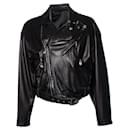 Gianni Versace, giacca da motociclista con spille da balia