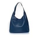 Prada, blue pocket hobo shoulder bag