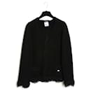 Cardigan Chanel 06C FR42 in cashmere nero Giacca Resort 2006 US12.