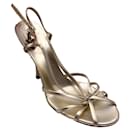 Gucci Gold Metallic Charm Embellished Strappy Leather Sandals - Autre Marque