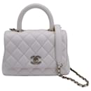 Chanel Coco Extra Mini Top Handle in pelle caviale bianca