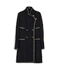 Abrigo vestido de tweed negro con botones de CC por 9,000 dólares. - Chanel