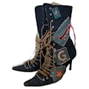 Lace-up denim boots by John Galliano