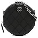 Bolso de mano redondo con cadena y puntada definitiva de piel de cordero acolchada en negro de Chanel