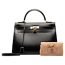 Hermes Box Kelly 32 Leather Handbag in Good condition - Hermès