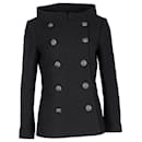 Abrigo con cuello barco y botonadura forrada Chanel en lana negra