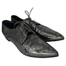 Miu Miu waxed shoes in dark silver