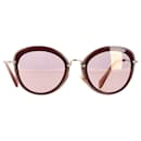 Rundige, verspiegelte Miu Miu-Sonnenbrillen aus rosa Acetat 