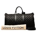 LOUIS VUITTON Monogram Light Up Keepall Bandouliere 50 Bolsa de viagem em lona M44770 Em uma boa condição - Louis Vuitton