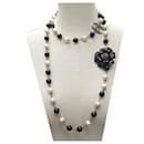 CHANEL NECKLACE CAMELIA AND PEARLS NECKLACE 120 CM IN SILVER METAL NECKLACE - Chanel