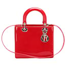 Bolsa vermelha Dior Lady Dior em couro envernizado