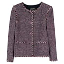Veste en tweed à boutons CC à 9 000 $. - Chanel