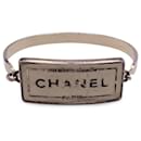 Vintage Silver Metal Beige Enamel Mademoiselle Bangle Bracelet - Chanel